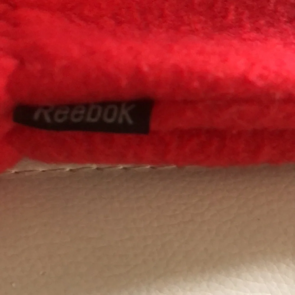 Red fleece gloves by Reebok warm good condition